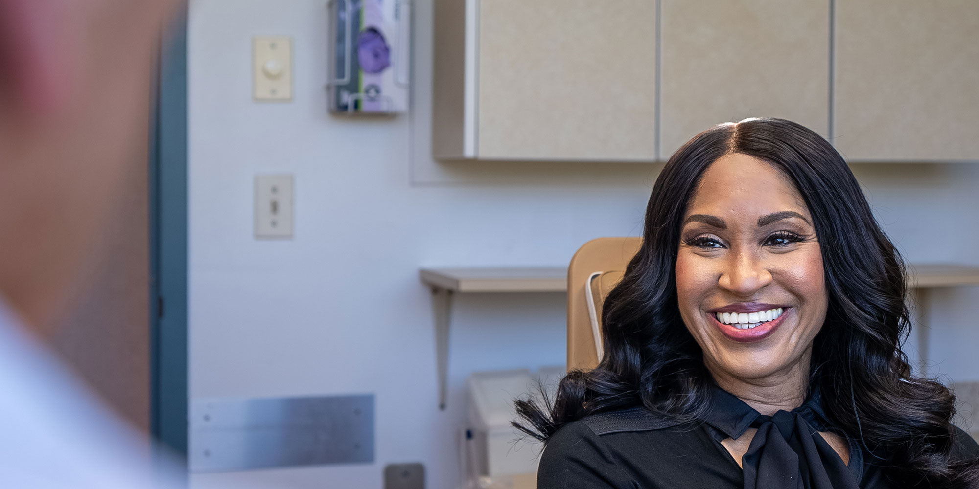 full arch dental implant patient smiling
